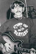 George_with_Stamp_Out_Beatles_sweater.jpg