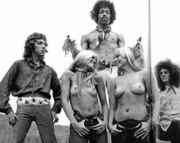 Hendrix_between_topless_girls_again.jpg