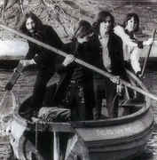 Beatles_in_a_boat.jpg